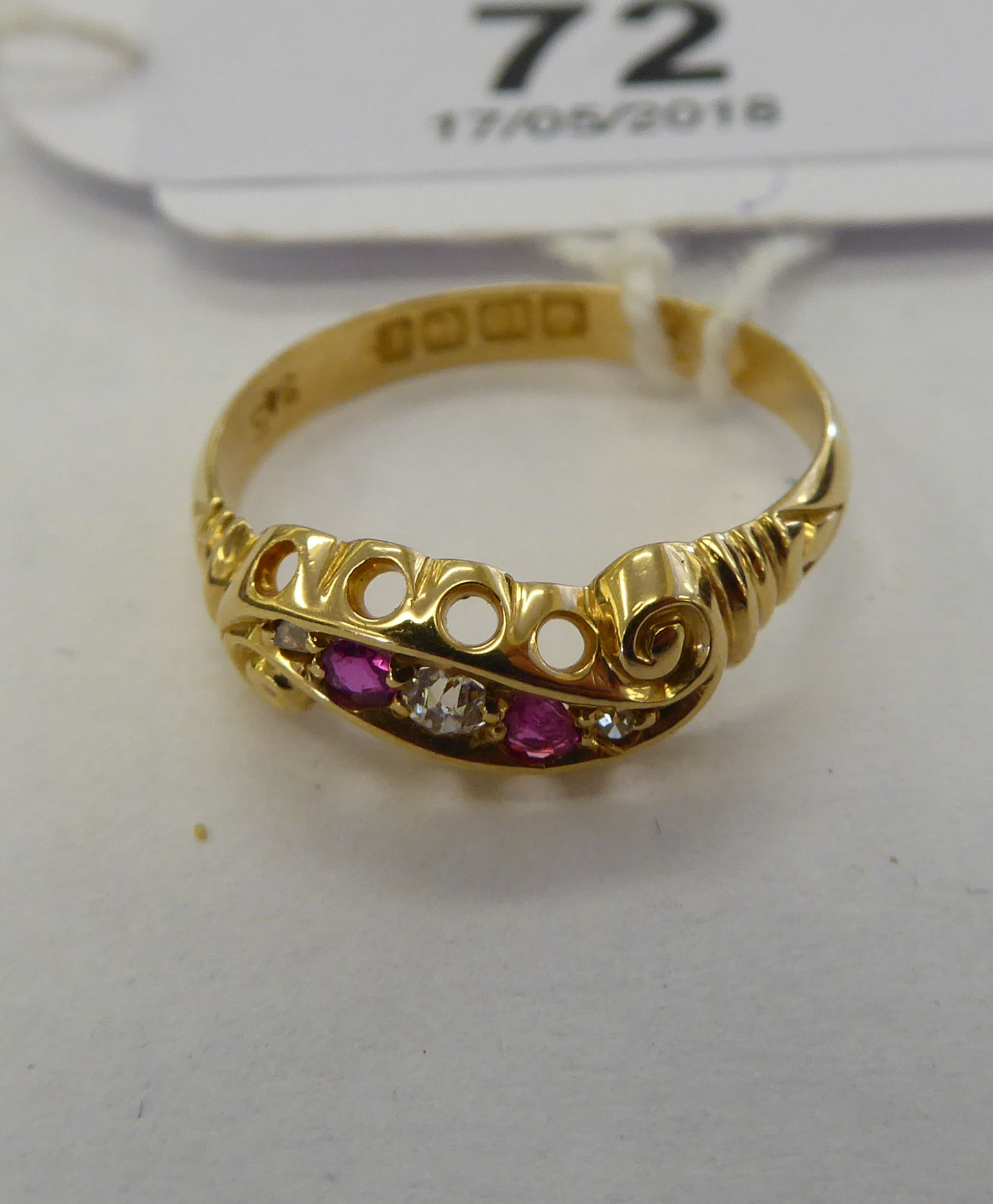 An Edwardian 18ct gold ring,