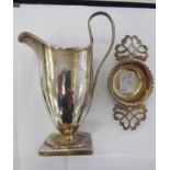 A George III silver cream jug London 1787;