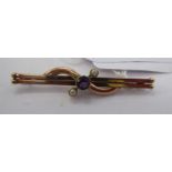 An 'antique' gold coloured metal amethyst and seed pearl set bar brooch 11