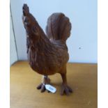 A rust coloured wrought iron model, a standing hen 12.