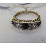 A 9ct gold sapphire and cubic zirconia set five stone ring 11