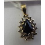 A 9ct gold pear shaped sapphire and diamond cluster pendant 11