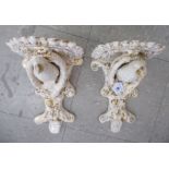 A pair of late 19thC Continental porcelain moulded, glazed and gilded Chinese wall brackets,