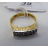 An 18ct gold double row diamond ring 11