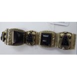 A Mexican white metal gatelink bracelet, set with onyx bead ornament,