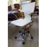 A Terry White design 'Euro' desk chair, the stitched white hide upholstered back,