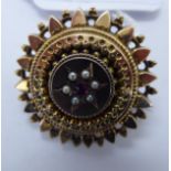An 'antique' 9ct gold ruby and seed pearl set,