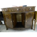 A modern Regency style mahogany bow front sideboard with three drawers and two doors,