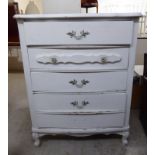 A modern white painted four drawer dressing chest,