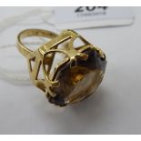 A 9ct gold claw set citrine dress ring 11