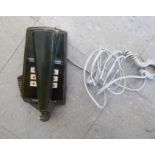A 'vintage' green leather clad Post Office push button telephone OS2