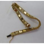 A 14ct gold flexible tablet link bracelet,