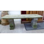 A modern composition stone garden bench,