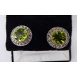 A pair of 'antique' 18ct gold peridot and diamond set cluster earrings 11