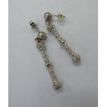A pair of 9ct white gold diamond set ball design earrings 11