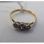 An 18ct gold and platinum ring,