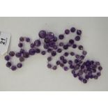 A graduated amethyst bead and crystal necklace 11