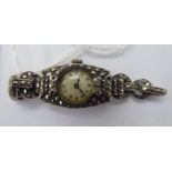 A lady's white metal cased and marcasite cocktail watch,