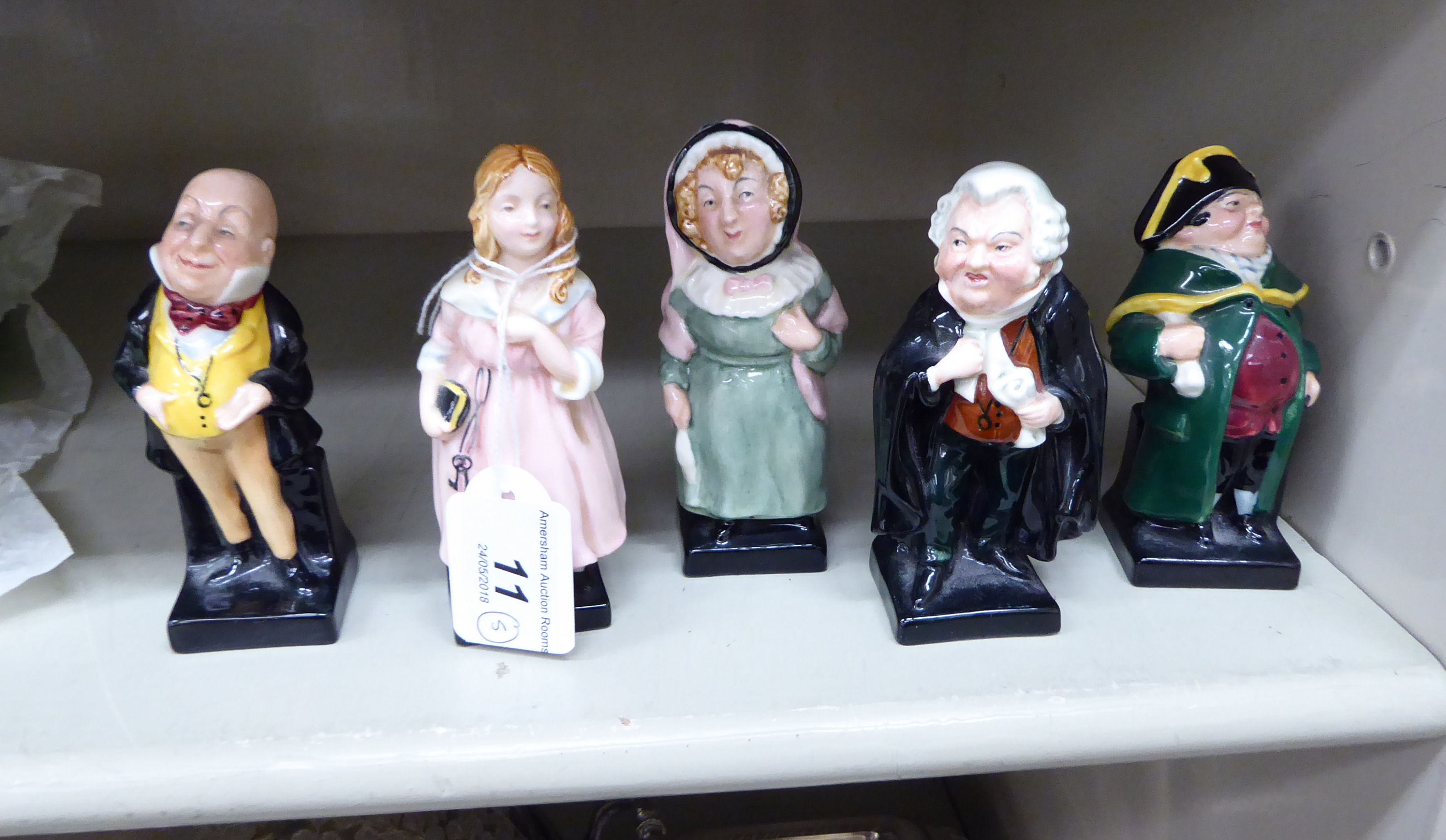 Five Royal Doulton china figures, viz.