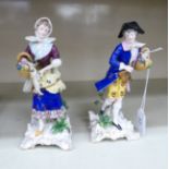 A pair of early 20thC Continental porcelain figures,