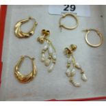 Yellow metal items of personal ornament: to include a pair of hoop earrings 11