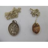 Two silver pendants,