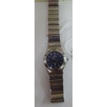 A lady's Omega Constellation stainless steel cased bracelet watch,