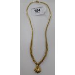 A 9ct gold necklace of wrap-over design,