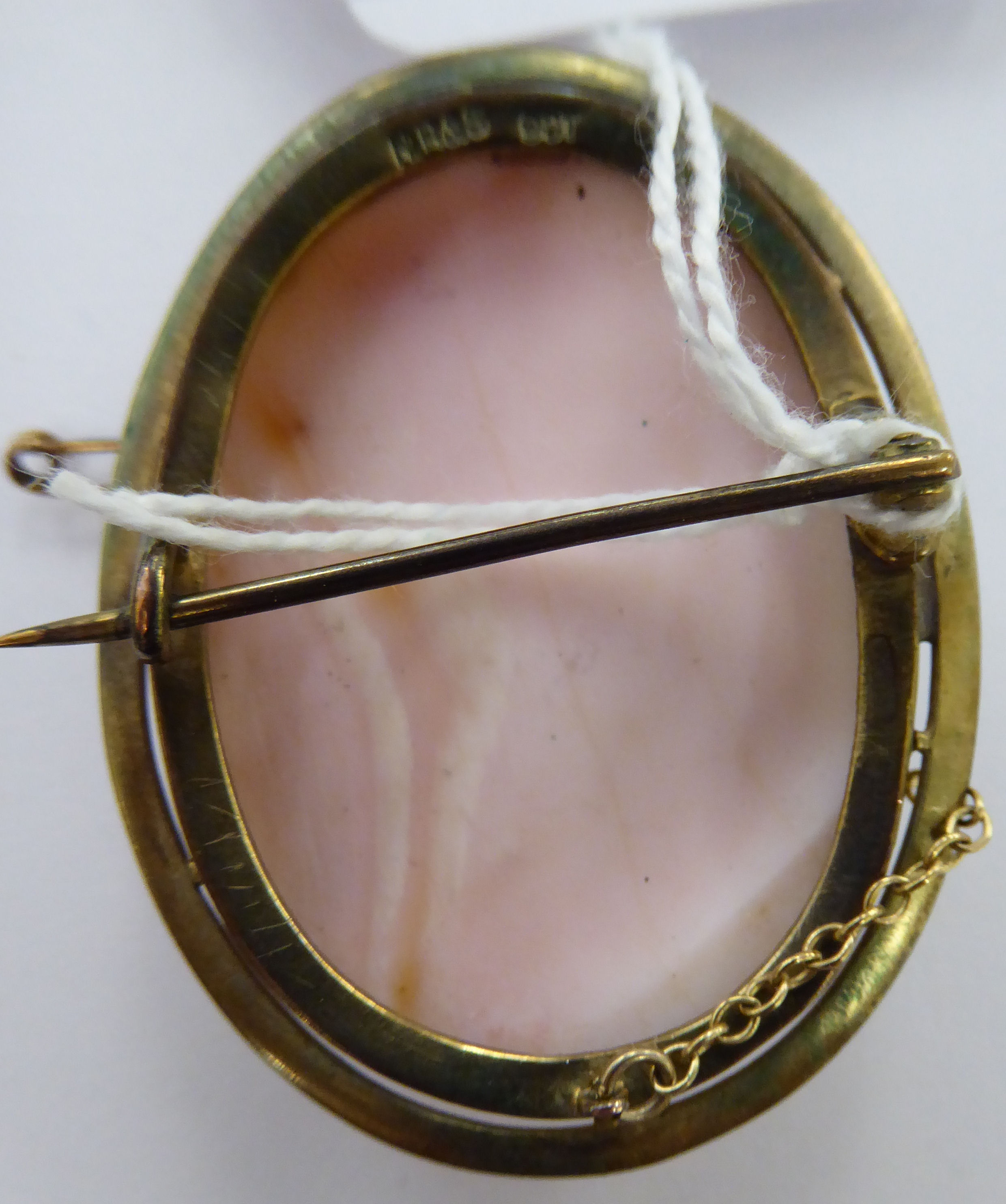 A late Victorian shell carved cameo brooch, depicting a profile portrait of a lady, - Image 2 of 2