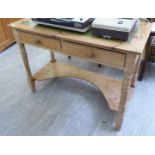 A re-constituted pine side table with an inset green hide scriber, over a pair of in-line drawers,