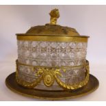 A late 19thC hobnail cut glass oval biscuit box with gilt metal mounts,