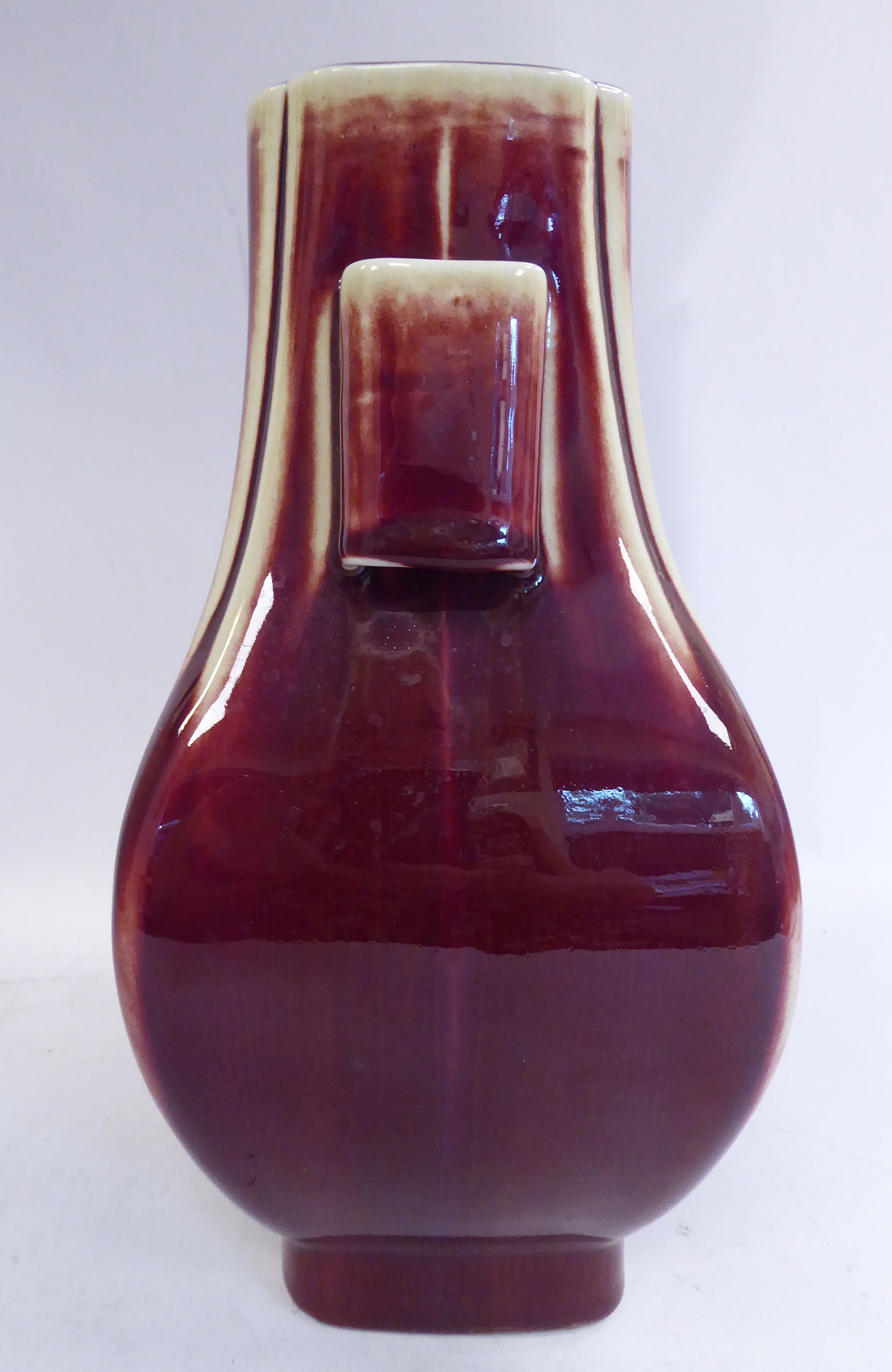 A 20thC Chinese 'rubbed' sang de boeuf glazed porcelain bulbous vase of panelled, - Image 4 of 7