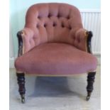 An early Victorian mahogany showwood framed tub design salon chair with enclosed arms,