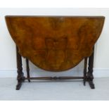 A late Victorian walnut Sutherland table,