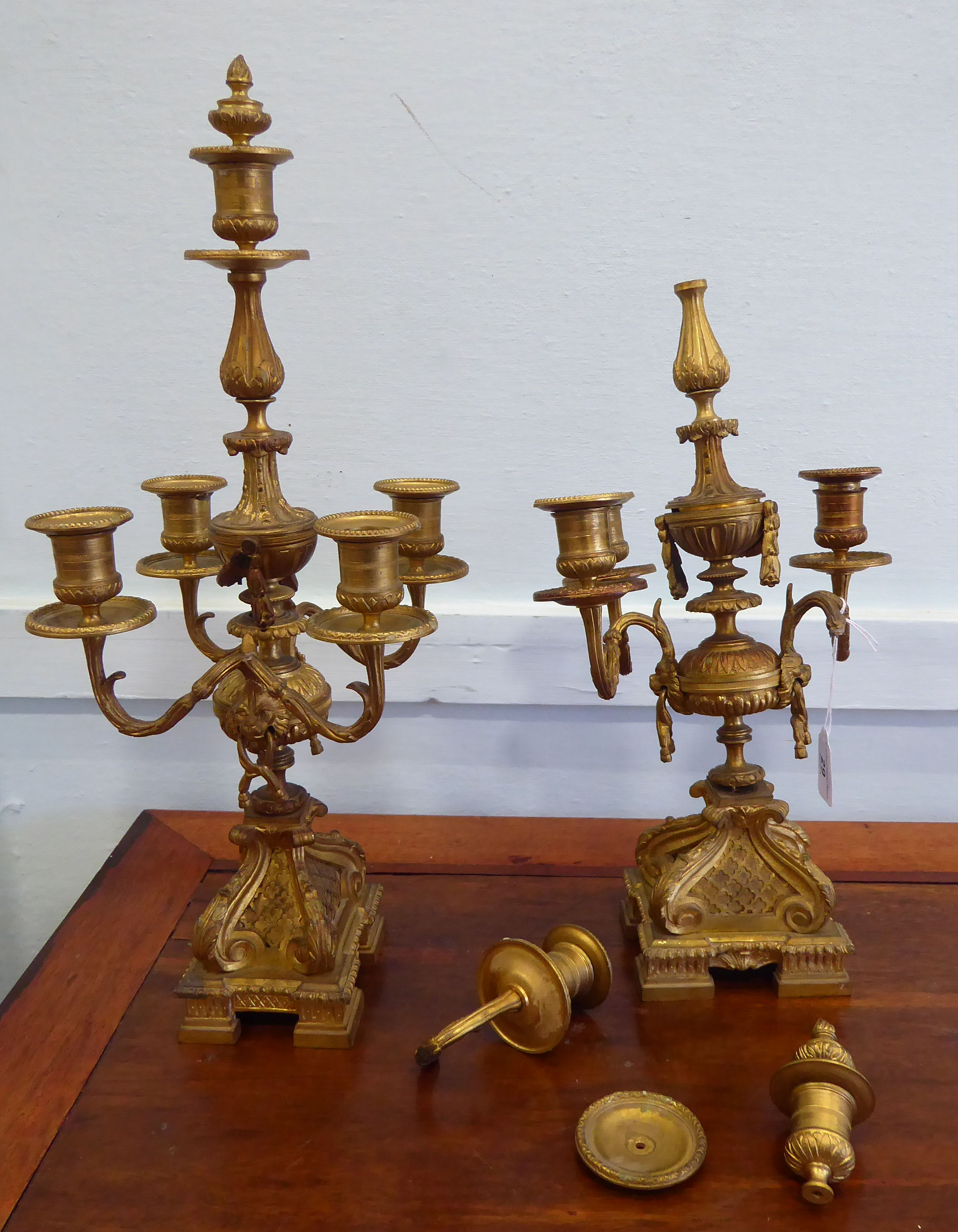 A pair of late 19thC Continental cast gilt metal candelabra,