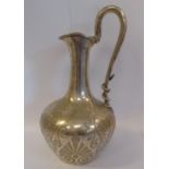 An early Victorian silver presentation ewer of squat, bulbous, bottle design,