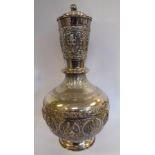 An Asian white metal bottle vase, having a long ring knopped,