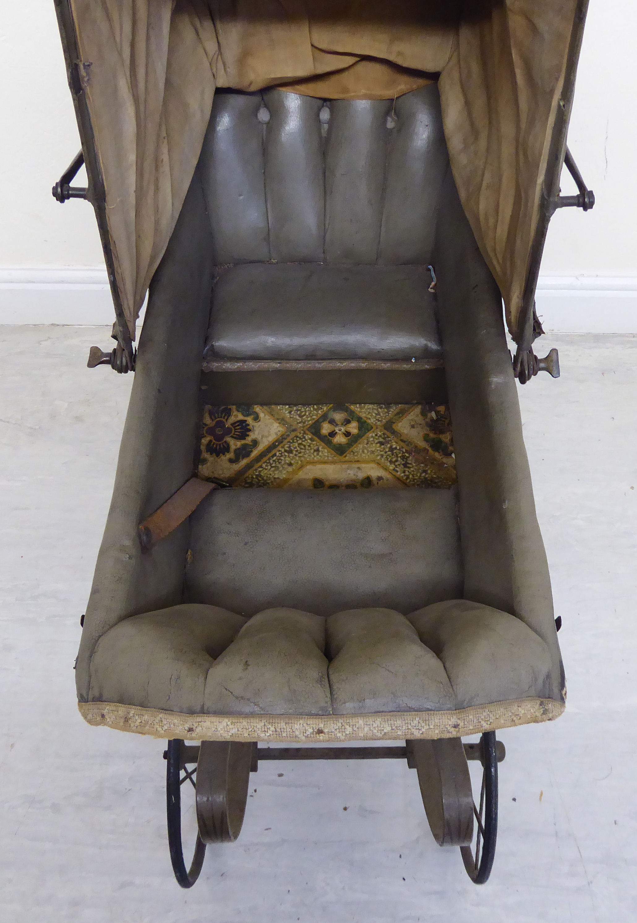 A late Victorian painted wooden dolls pram with a retractable canopy and a grey hide upholstered - Image 7 of 8