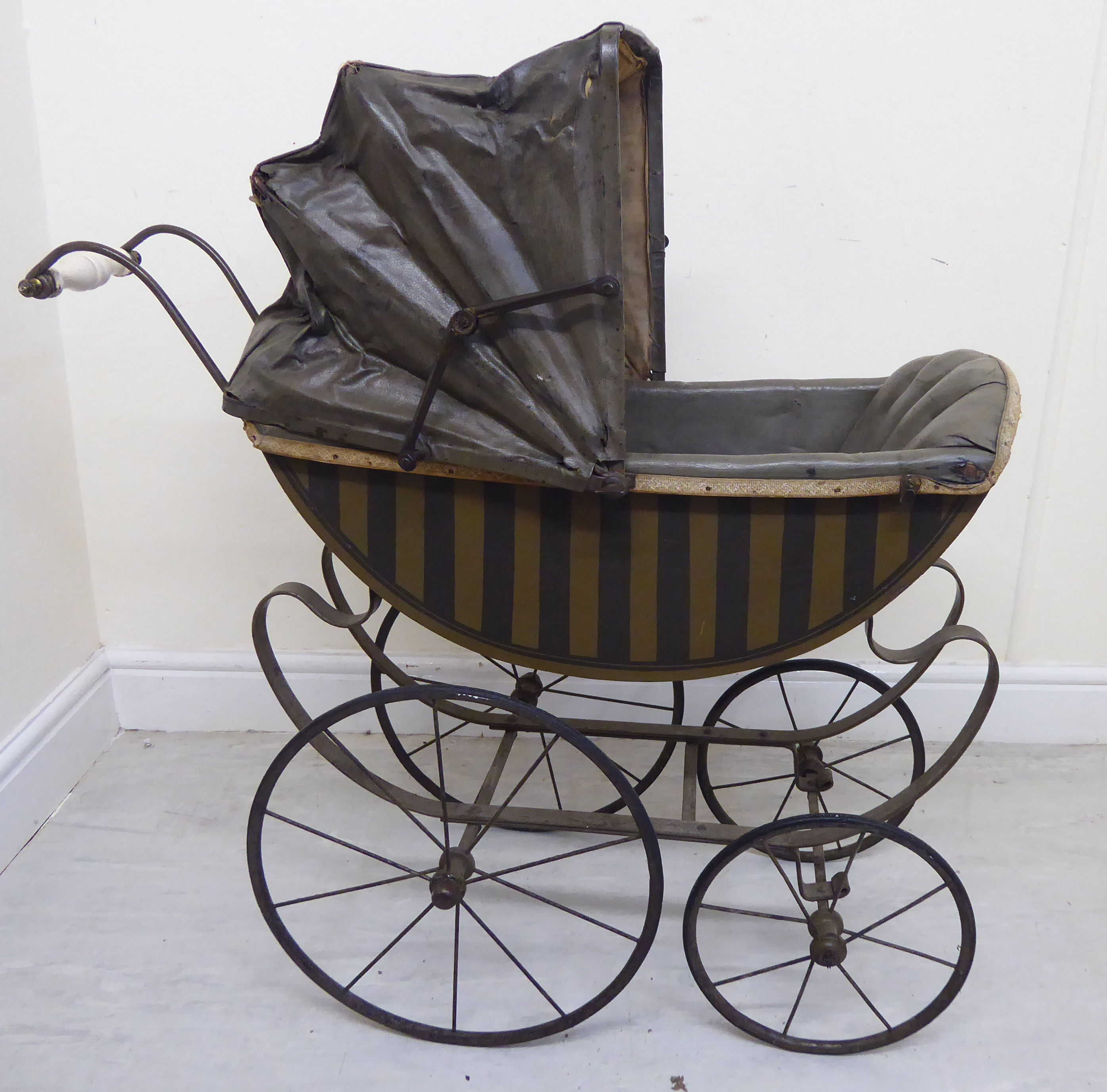 A late Victorian painted wooden dolls pram with a retractable canopy and a grey hide upholstered - Image 5 of 8