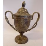 A silver ovoid shaped pedestal trophy cup and cover with entwined handles JG Birmingham 1955