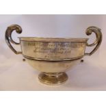 A silver twin handled, rose bowl design, pedestal trophy cup Henry Wilkinson & Co London 1910 5.