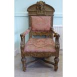 A late 19th/early 20thC Continental, upholstered, carved and painted gilt side chair,