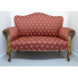 An early 19thC French carved and gilt painted, showwood framed settee, with a high, straight,