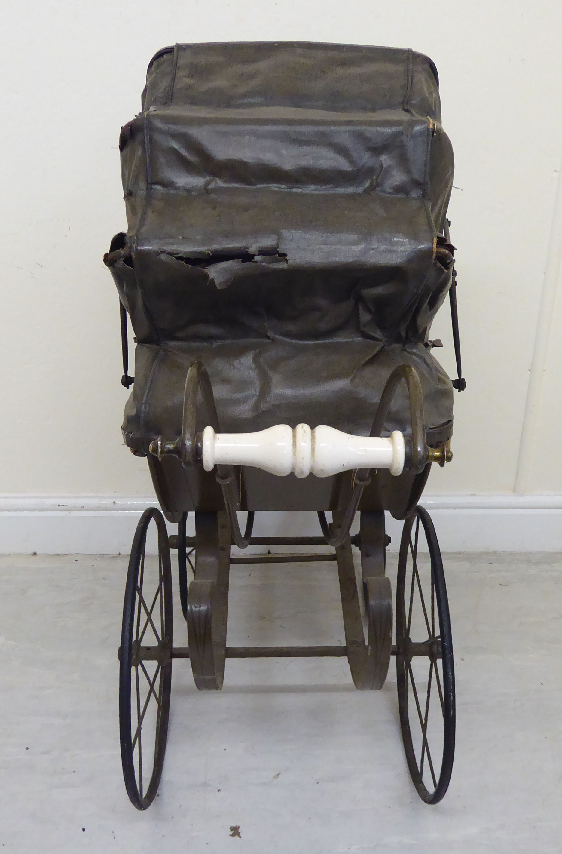 A late Victorian painted wooden dolls pram with a retractable canopy and a grey hide upholstered - Image 6 of 8