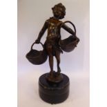 S Bizard - a cast and patinated bronze standing cherubic figure,