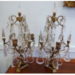 A pair of late 19thC Continental cast gilt metal table candelabra,
