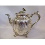 An early Victorian silver teapot of segmented,