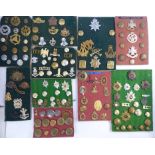 An uncollated collection of military and associated badges,