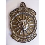 A George III silver Sun Fire Office Fire Patrole arm badge,