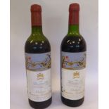 Two bottles of Chateau Mouton Rothschild wine 1981 and three 1985